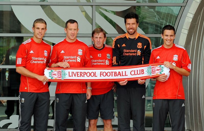 Kenny Dalglish presents Jordan Henderson and other new signings in 2011.