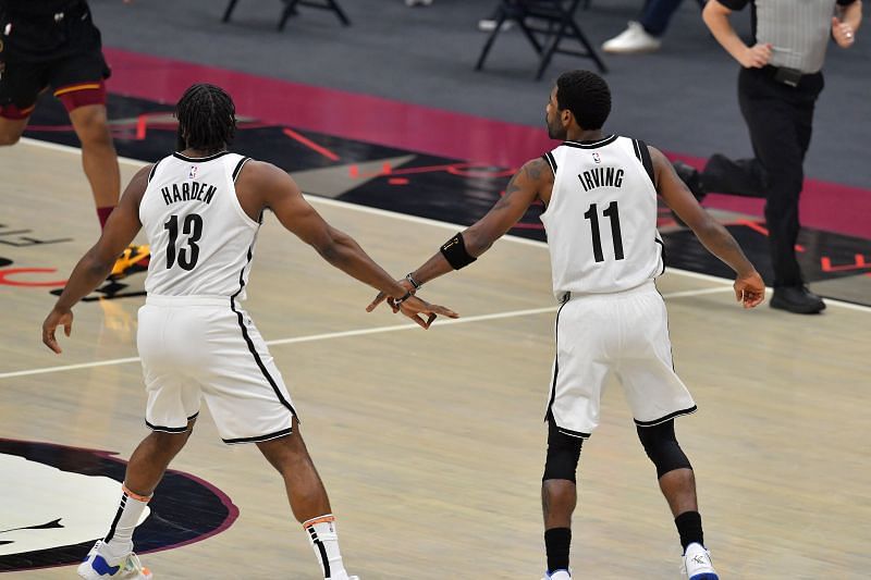 James Harden #13 and Kyrie Irving #11 of the Brooklyn Nets