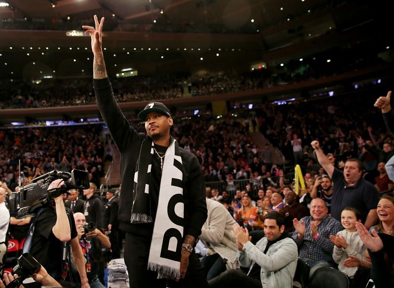 Former New York Knicks player Carmelo Anthony waves to the fans at Madison Square Garden