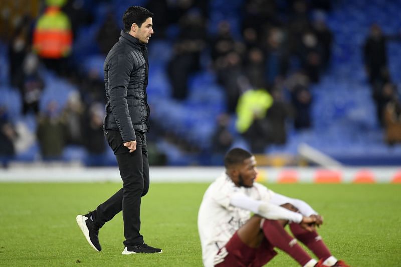 Mikel Arteta (L) and Ainsley Maitland-Niles