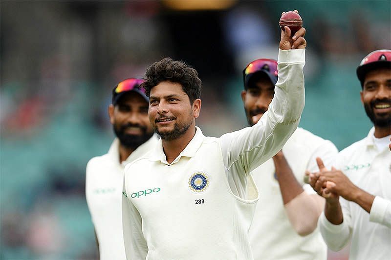Kuldeep Yadav celebrates after picking up a five-wicket haul in Sydney
