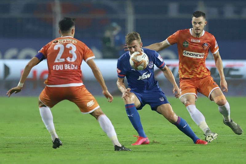 Bengaluru FC&#039;s Kristian Opseth (centre) in action against FC Goa&#039;s Edu Bedia and James Donachie in their previous ISL match (Image Courtesy: ISL Media)