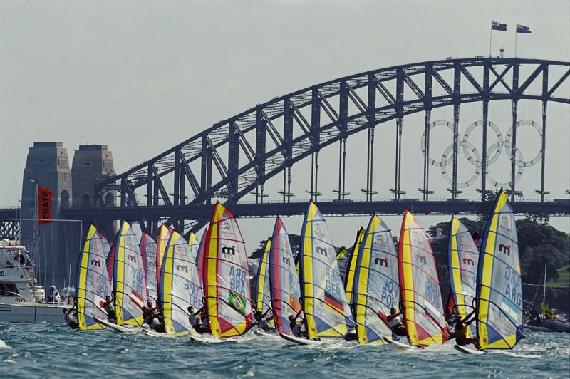 Competitors during the Men&#039;s Windsurfer event near Sydney Bridge during the XXVII Summer Olympic Games in September 2000 on the Rushcutters Bay Marina, Rose Bay, Sydney, Australia.