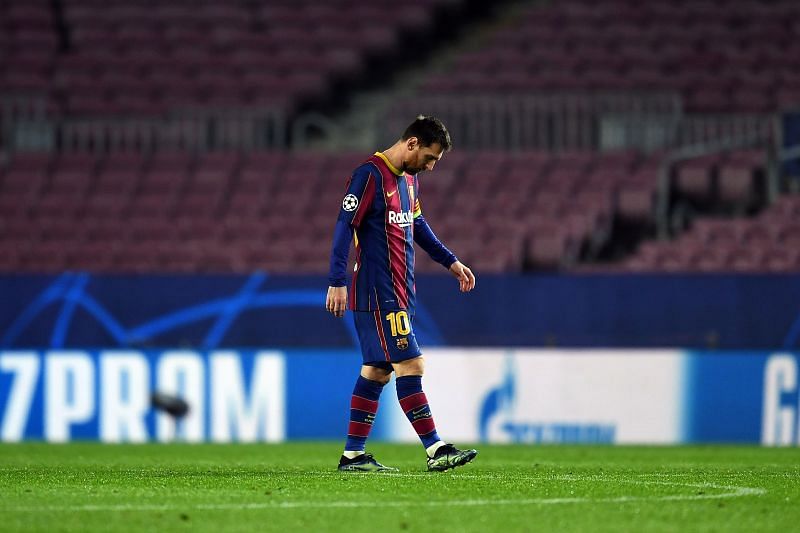 Lionel Messi looks dejected after losing to Paris Saint-Germain in the first leg of their Round of 16 tie