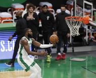 Jaylen Brown #7 of the Boston Celtics drives to the basket.
