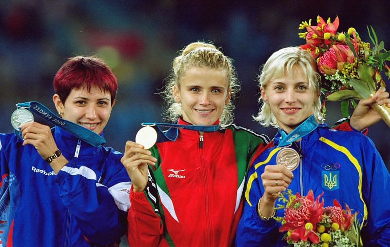 Tereza Marinova (C) of Bulgaria wins gold at the Sydney 2000 Olympic Games