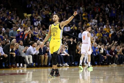 Stephen Curry of the Golden State Warriors reacts after a made basket against the New York Knicks 