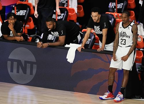 Lou Williams #23 of the LA Clippers and the LA Clippers bench react during the fourth quarter against the Denver Nuggets in Game Five of the Western Conference Second Round during the 2020 NBA Playoffs at The Field House at the ESPN Wide World Of Sports Complex on September 11, 2020 in Lake Buena Vista, Florida. (Photo by Michael Reaves/Getty Images)