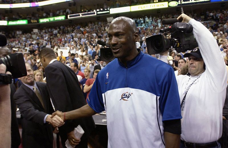 Michael Jordan walks off court at career finale.