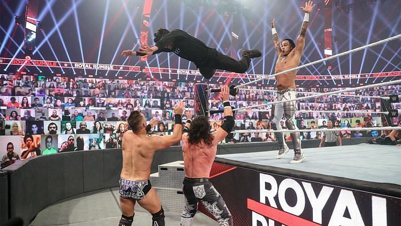 Damian Priest at the 2021 Royal Rumble as Bad Bunny dives on The Miz and John Morrison