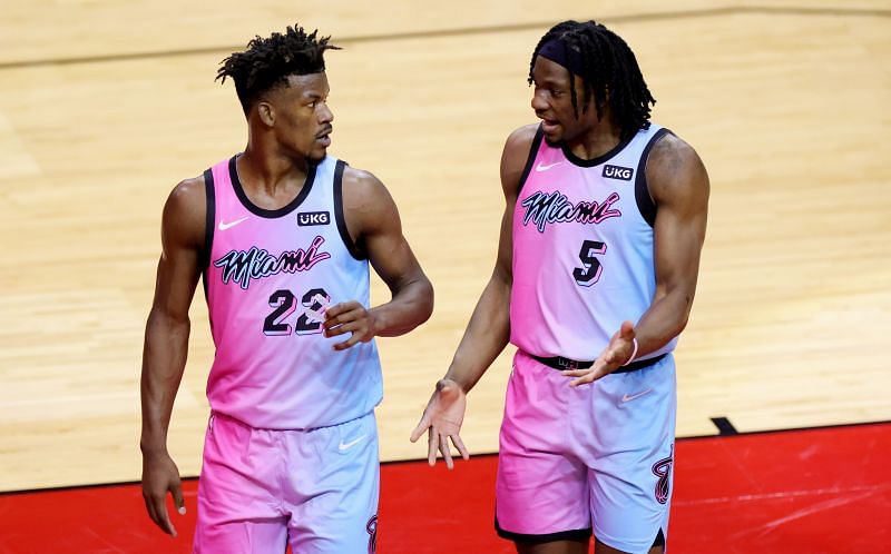 Jimmy Butler #22 and Precious Achiuwa #5 of the Miami Heat talk during the second quarter against the Houston Rockets 