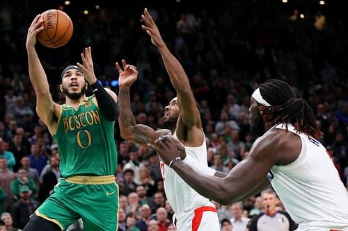 Jayson Tatum #0 of the Boston Celtics takes a shot against Kawhi Leonard #2 of the LA Clippers.