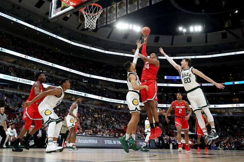 The Ohio State Buckeyes attempt a shot in the first half against the Michigan State Spartans