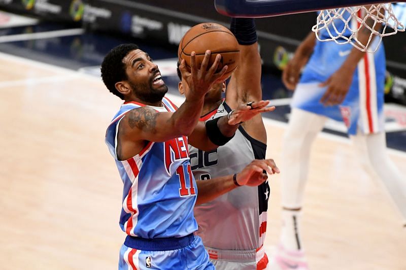 Brooklyn Nets&#039; (#11) Kyrie Irving on a lay-up attempt