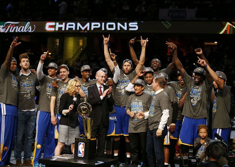 The Golden State Warriors celebrate their Larry O&#039;Brien NBA Championship Trophy after winning Game Six of the 2015 NBA Finals.