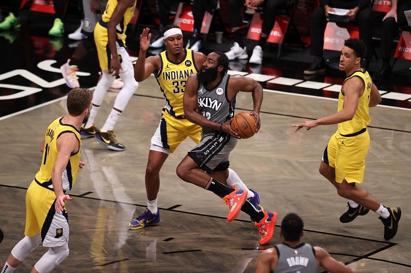 James Harden #13 of the Brooklyn Nets shoots against Miles Turner #33 of the Indiana Pacers