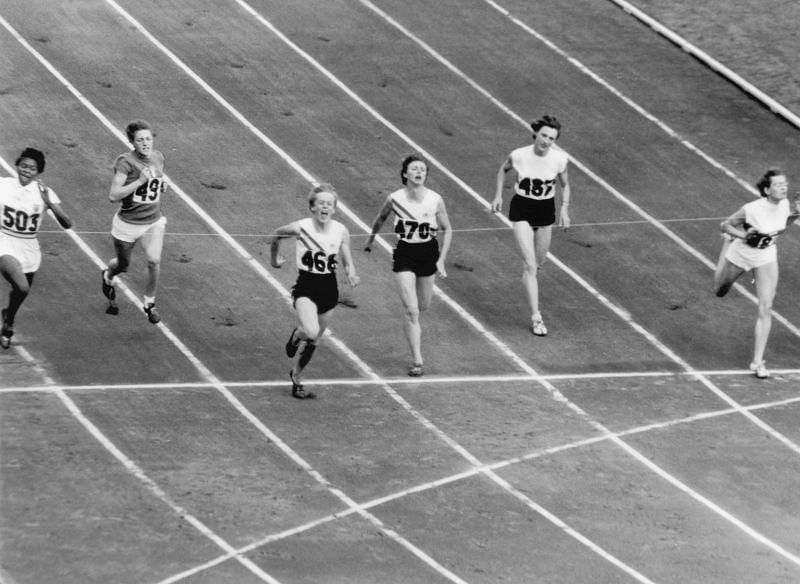 Betty Cuthbert of Australia (No.468) wins the women&#039;s 100 metres final at the Melbourne Olympics, 2nd December 1956.