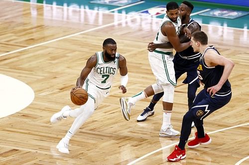 Jaylen Brown (#7) of the Boston Celtics drives towards the basket.