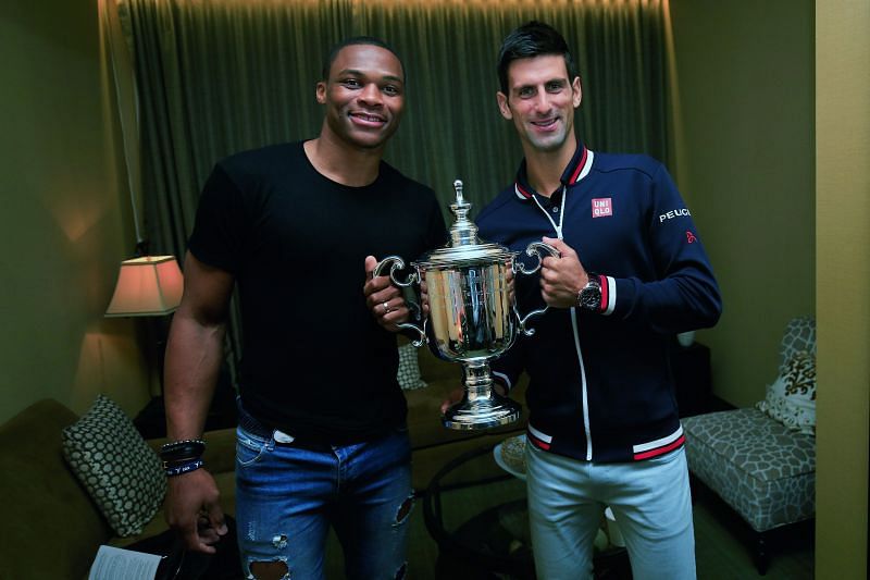 Novak Djokovic poses with NBA player Russell Westbrook in 2012