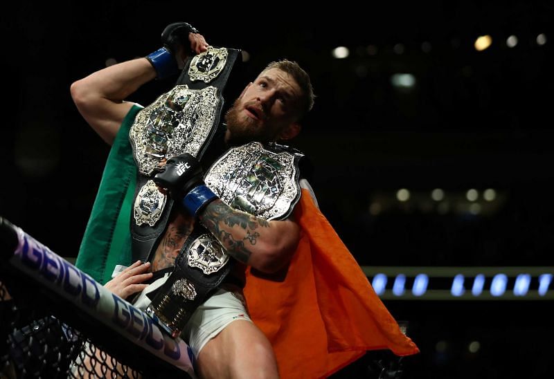 The UFC borrowed Tyron Woodley's belt for McGregor's photo-ops at UFC 205