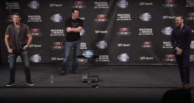 Conor McGregor (Right) shared the stage with Michael Bisping (Left) and Chael Sonnen (Center) in 2013.