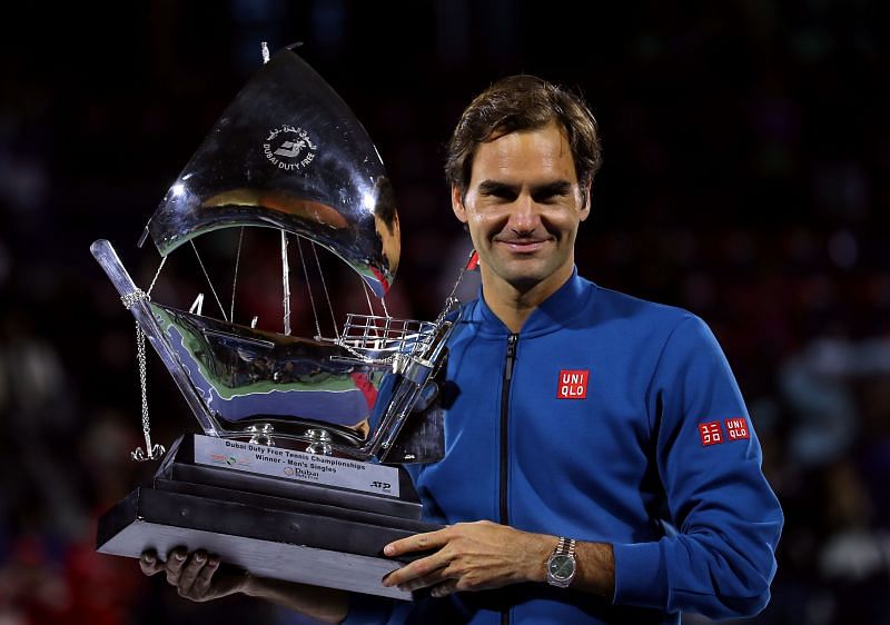 Roger Federer with the winner's trophy at the Dubai Duty Free Tennis Championships