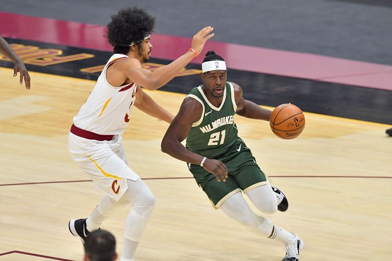 Milwaukee Bucks&#039; Jrue Holiday (R) in action