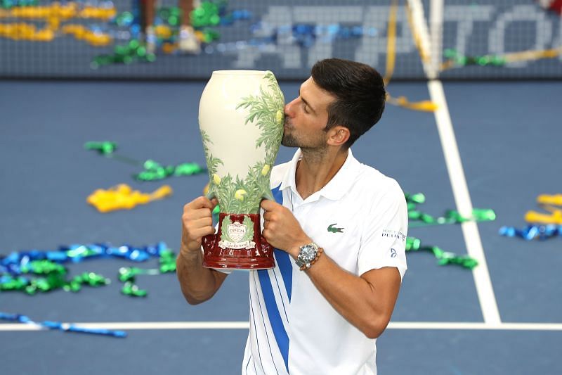 Novak Djokovic kisses the Cincinnati Masters trophy