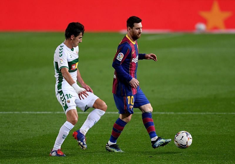 Lionel Messi (right)