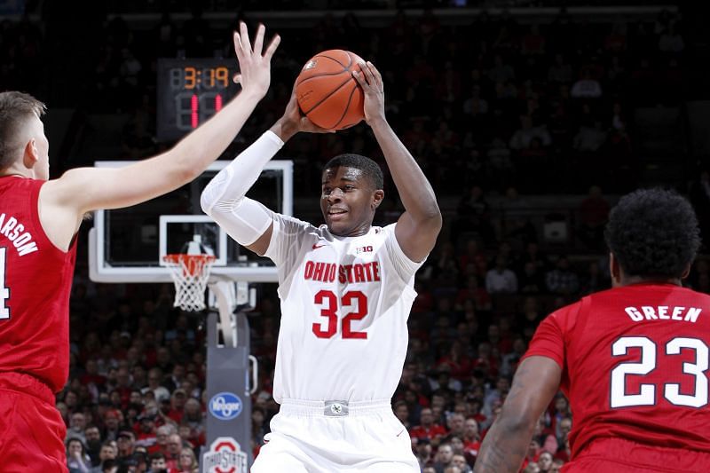 E.J. Liddell #32 of the Ohio State Buckeyes looks to pass the ball