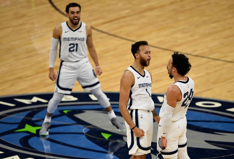 Tyus Jones #21, Kyle Anderson #1, and Dillon Brooks #24 of the Memphis Grizzlies 