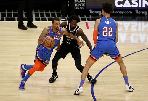 George Hill of the OKC Thunder goes up against Patrick Beverley of the LA Clippers