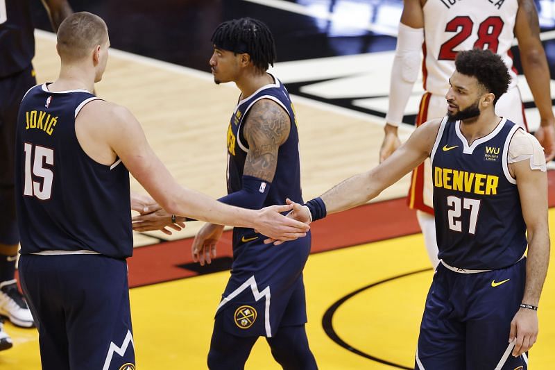 Nikola Jokic #15 and Jamal Murray #27 of the Denver Nuggets celebrate against the Miami Heat during the fourth quarter at American Airlines Arena on January 27, 2021 in Miami, Florida. (Photo by Michael Reaves/Getty Images)