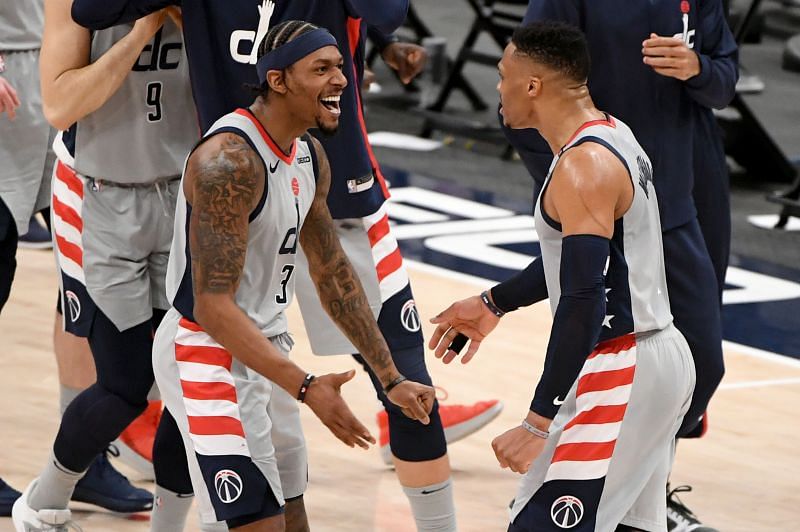 Russell Westbrook of the Washington Wizards celebrates with Bradley Beal after making the game-winning shot against the Brooklyn Nets