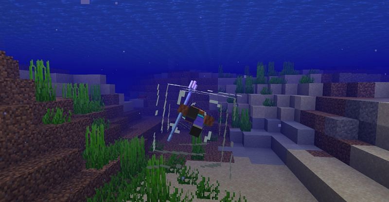 Using the Riptide enchantment to propel forward underwater in Minecraft. (Image via Minecraft)