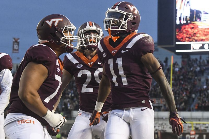 Virginia Tech OT Christian Darrisaw celebrates a touchdown with teammates