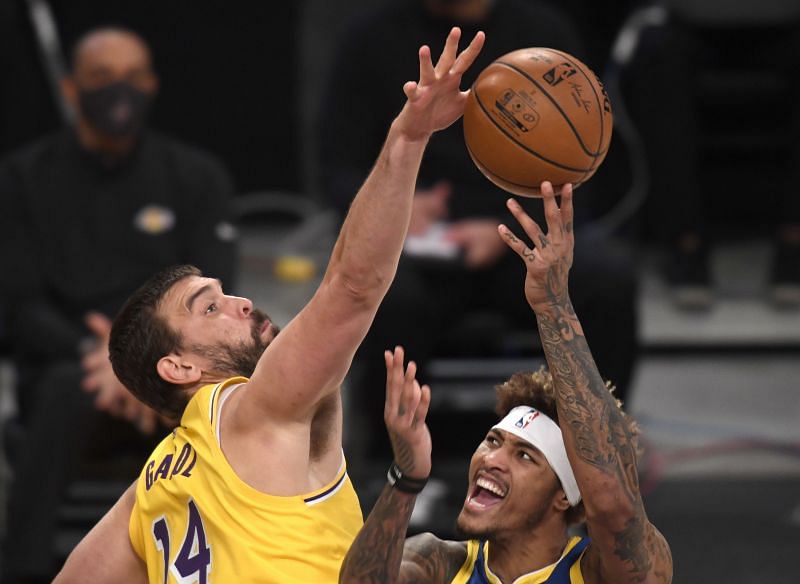 Marc Gasol #14 of the Los Angeles Lakers blocks Kelly Oubre Jr. #12 of the Golden State Warriors