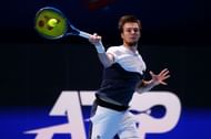 Alexander Bublik hits a forehand in Singapore