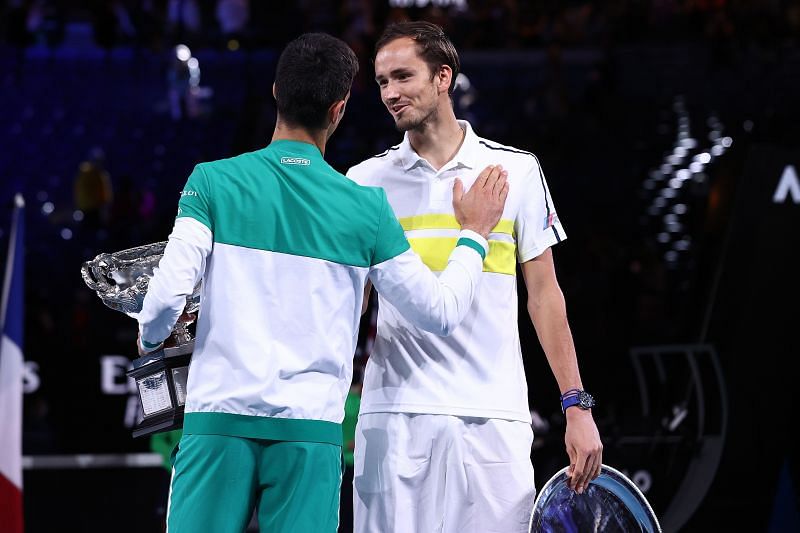 Novak Djokovic and Daniil Medvedev with their trophies