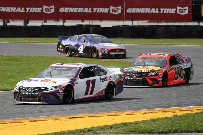 Denny Hamlin leads Martin Truex Jr. and Kevin Harvick at Daytona. Photo/Getty Images