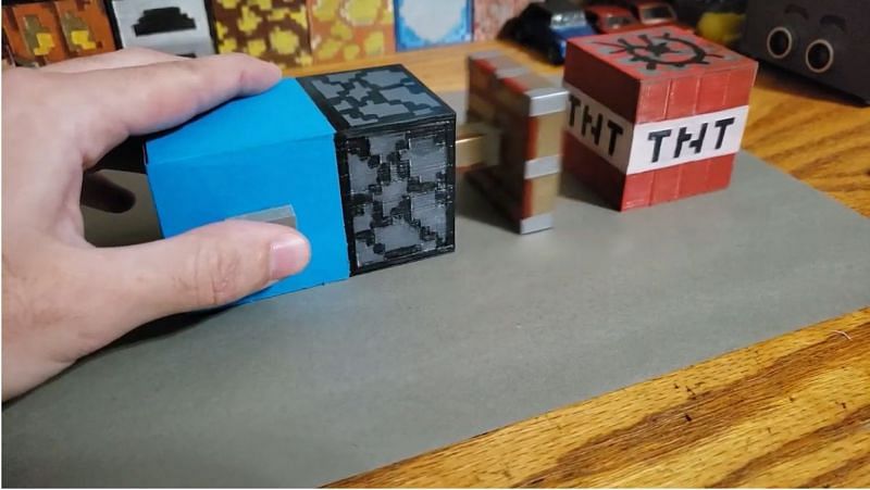 A functioning replica of a Minecraft piston. (Image via Hecbac/YouTube)