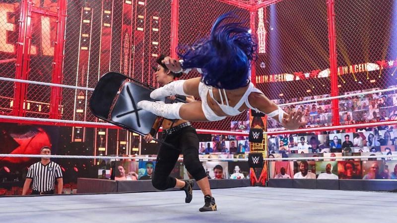 Bayley and Sasha Banks inside Hell in a Cell