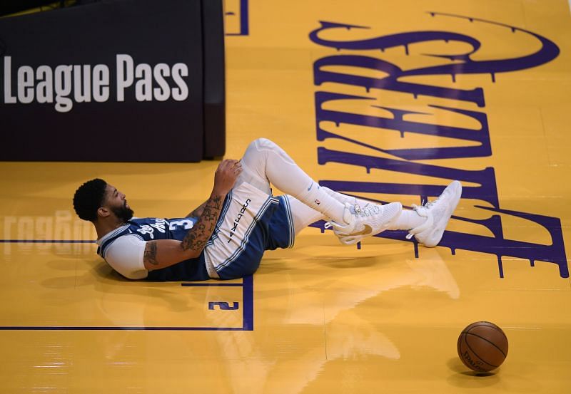Anthony Davis #3 of the Los Angeles Lakers falls to the floor against the Denver Nuggets. Photo: Harry How/Getty Images.