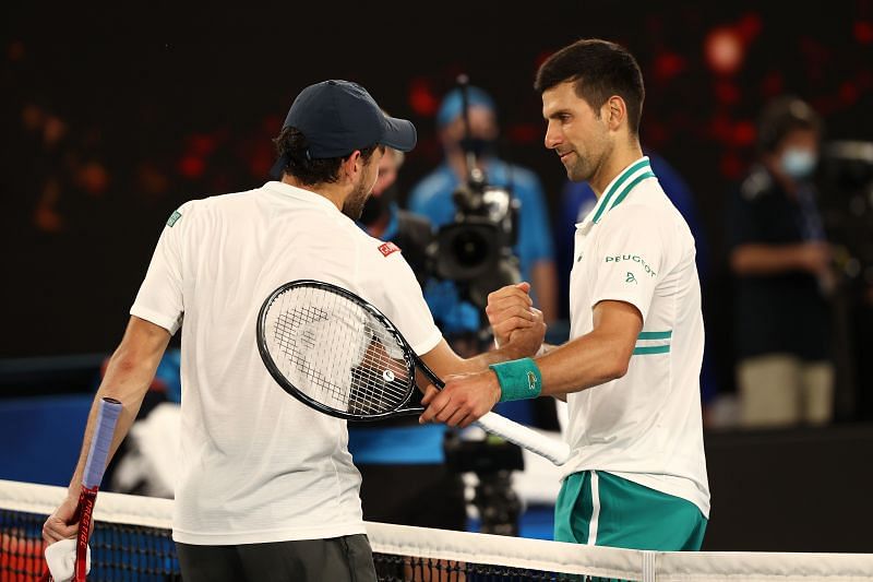 Novak Djokovic shakes hands with Aslan Karatsev at the 2021 Australian Open