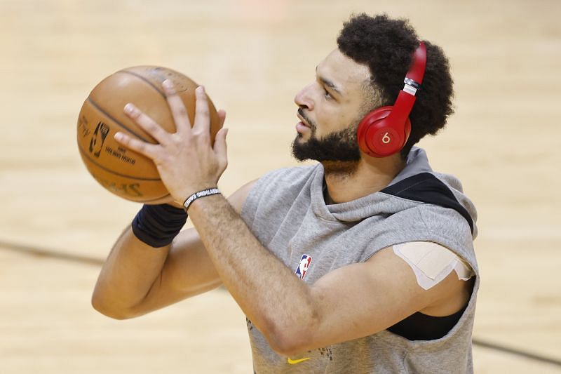 Jamal Murray #27 of the Denver Nuggets warms up prior to the game against the Miami Heat at American Airlines Arena on January 27, 2021 in Miami, Florida. (Photo by Michael Reaves/Getty Images)