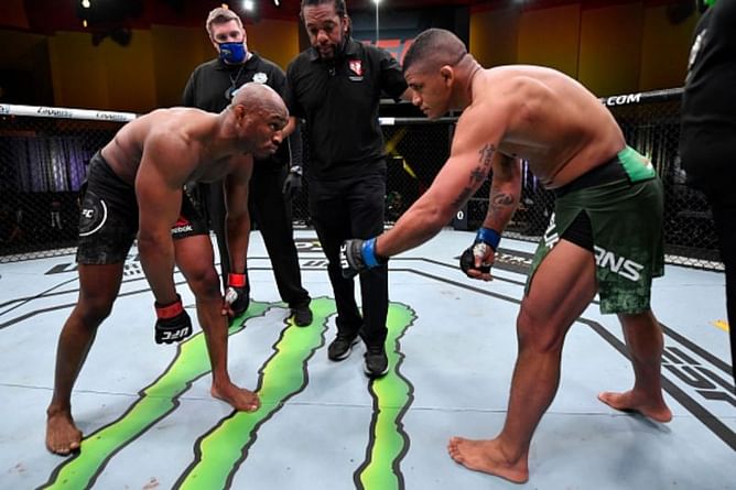 The emotional embrace between Kamaru Usman and Gilbert Burns after their UFC 258 war