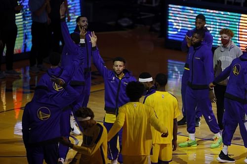 Stephen Curry #30 of the Golden State Warriors is introduced for their game against the Portland Trail Blazers Jimmy Butler