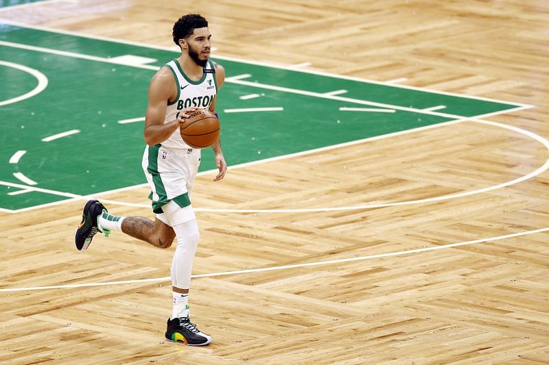 Jaylen Brown dribbles up court for the Boston Celtics