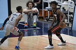 Jimmy Butler and Bradley Beal react in contrasting moods to Washington Wizards' 103-100 win over Miami Heat