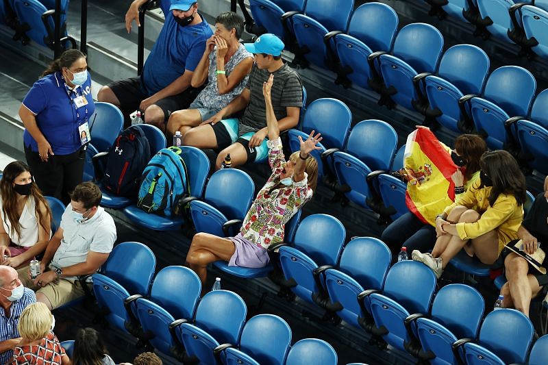 The woman who heckled Rafael Nadal (centre of the photo with arms raised)